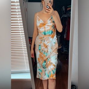 Orange, green and white tie dye midi dress with cowl neck.